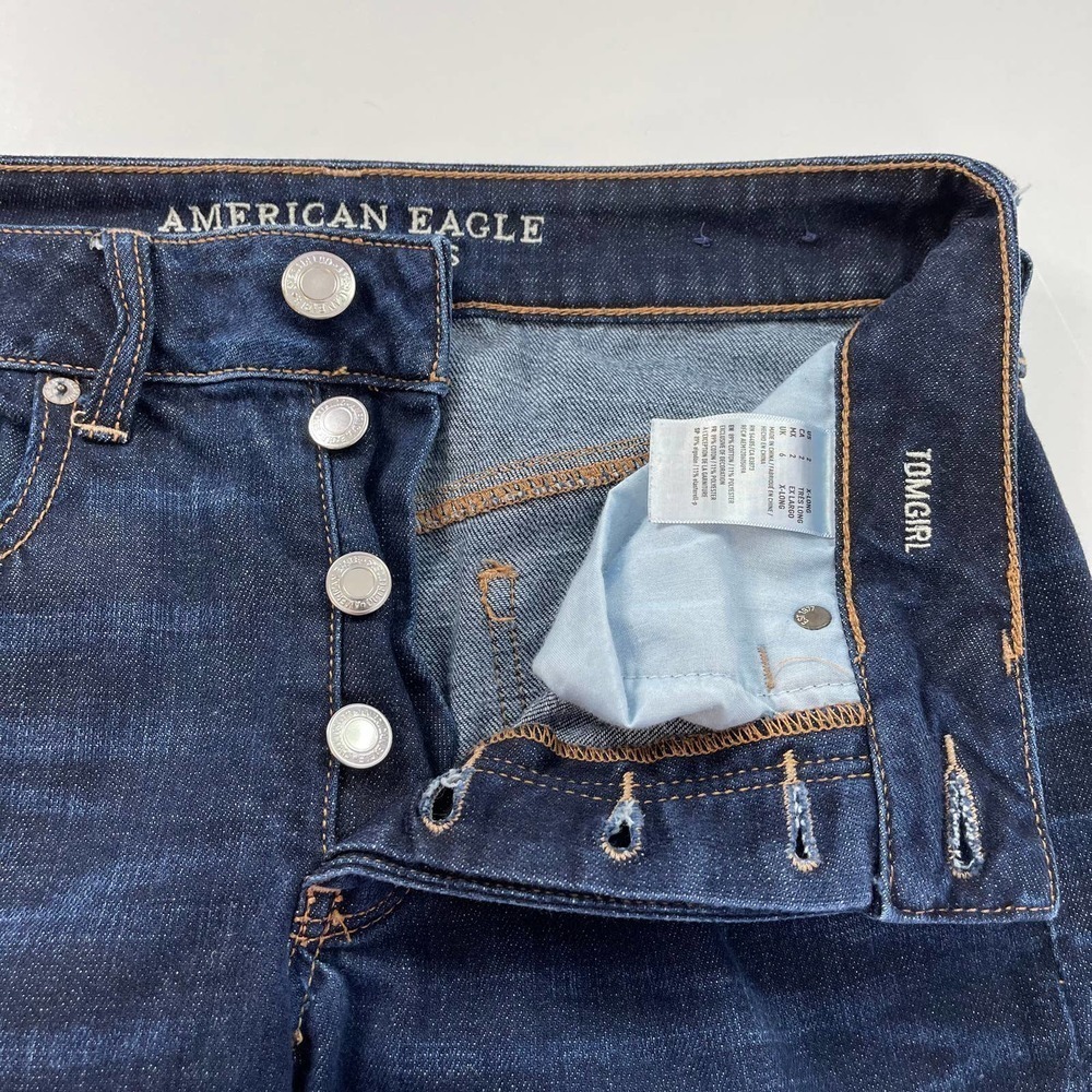 American Eagle TOMGIRL step hem button fly jeans